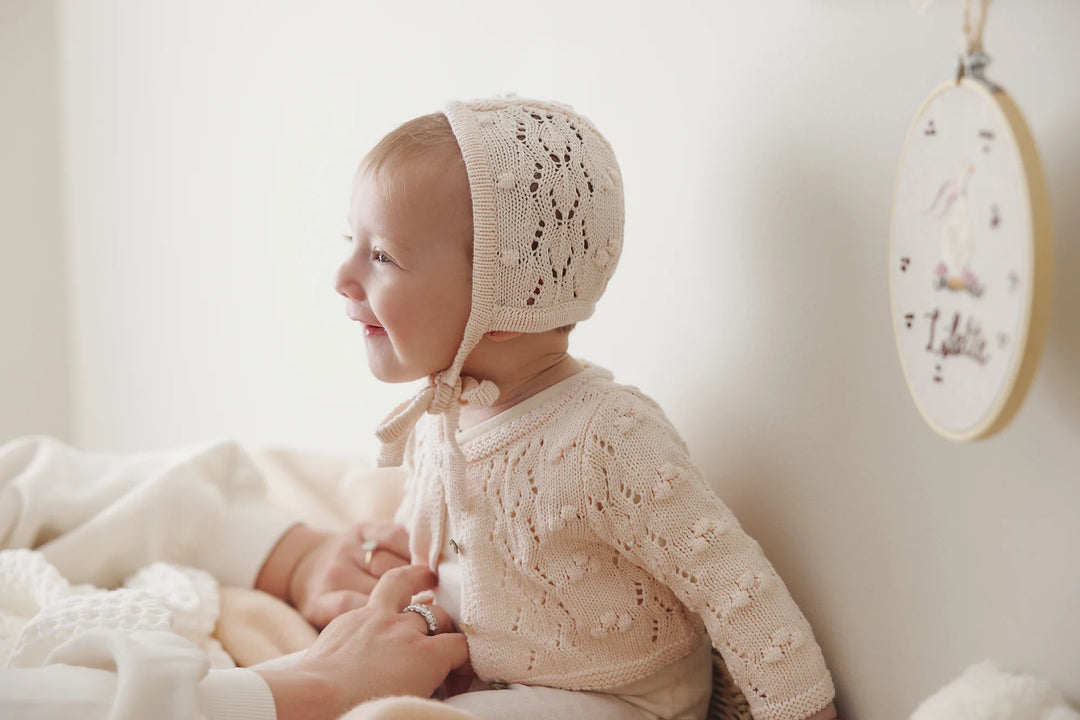 top l/s popcorn weave cardigan with bonnet - petal