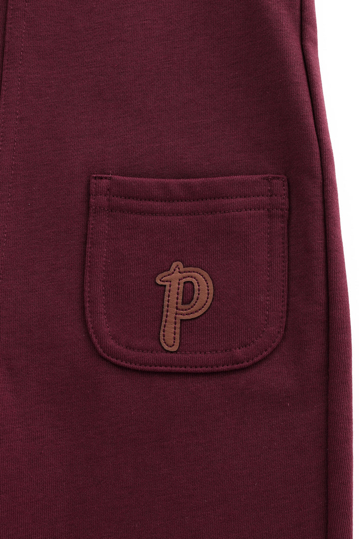 side pocket romper - burgundy