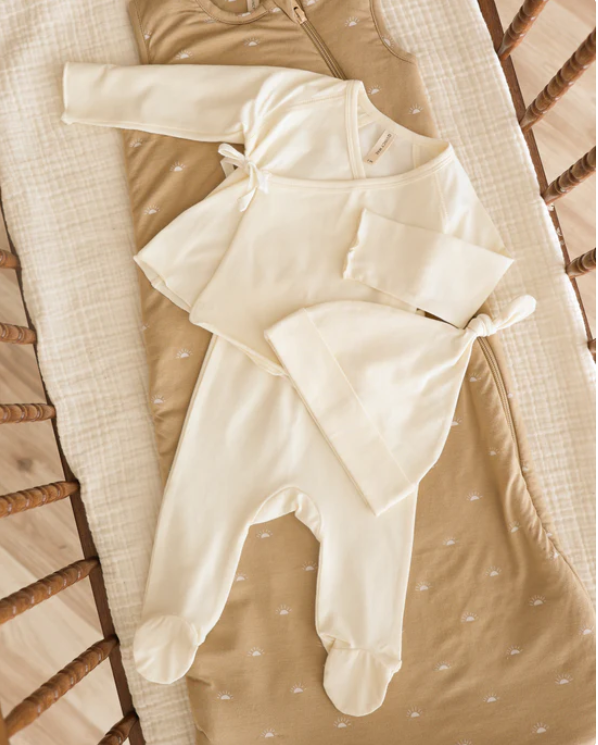 set knit jersey wrap top and footie pants with beanie - ivory