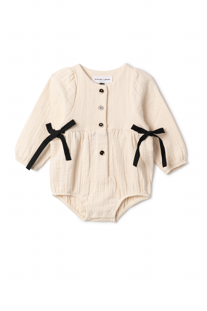 one piece woven henley bubble romper with side ties - off white