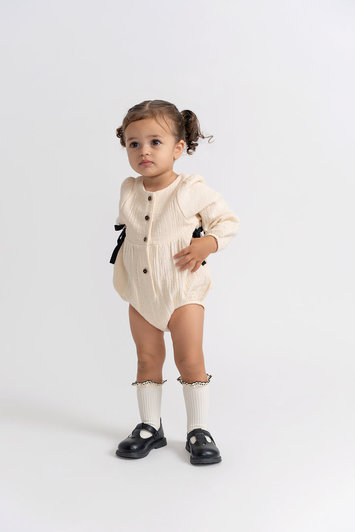 one piece woven henley bubble romper with side ties - off white