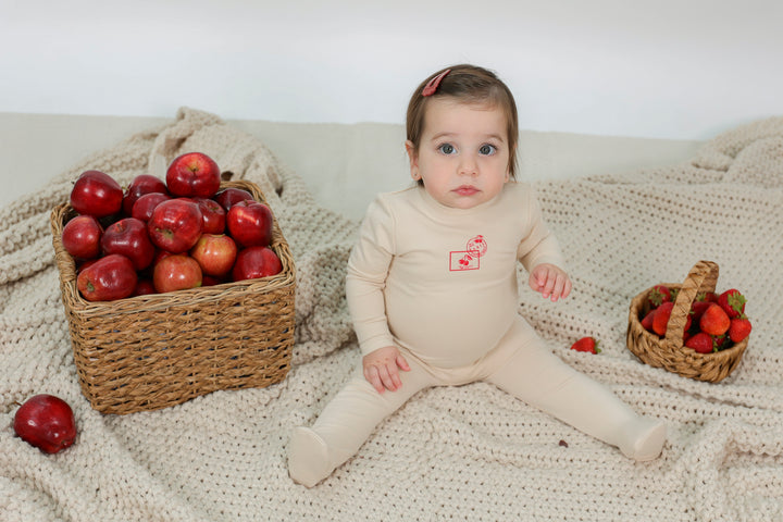 footie stamp print - dark almond/red