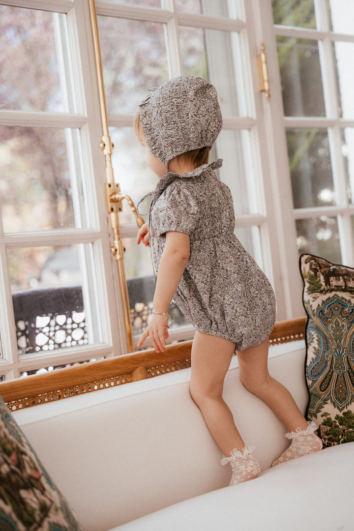 one piece whitmore romper smocked floral with collar and bonnet - lilac floral