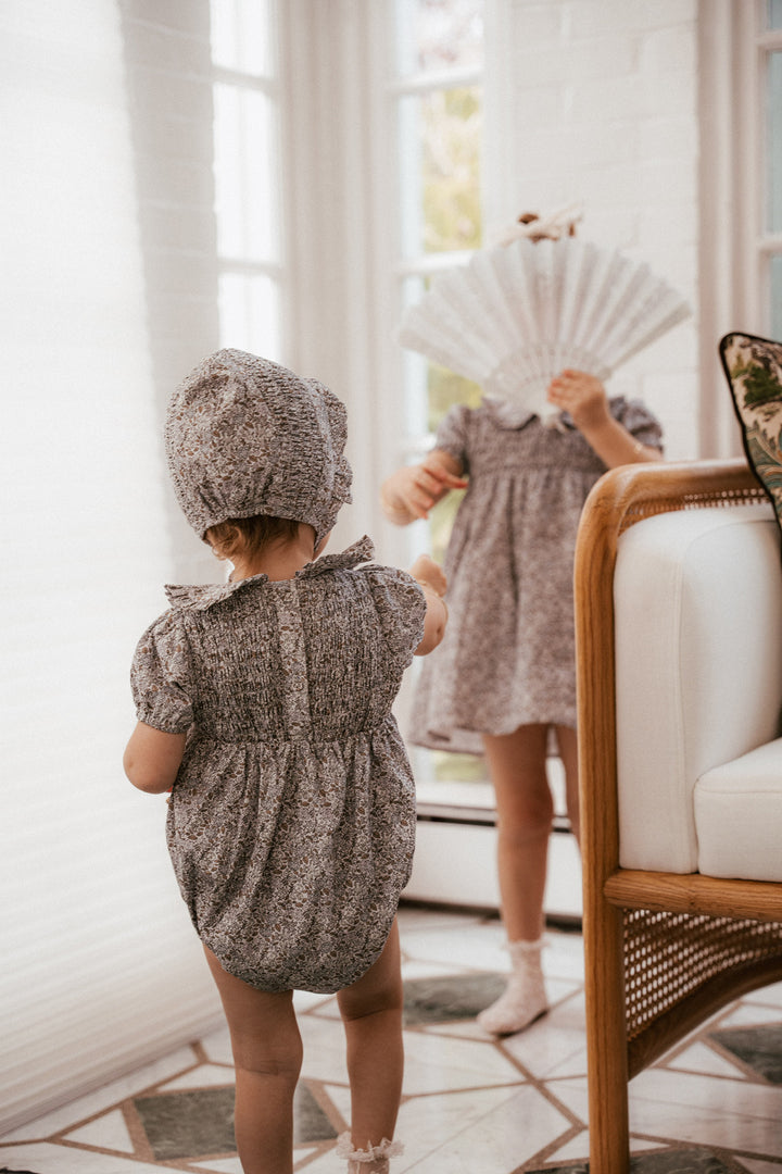 one piece whitmore romper smocked floral with collar and bonnet - lilac floral