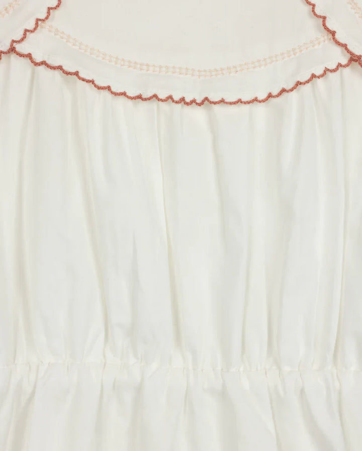 dress s/s sleeves scalloped bib - white